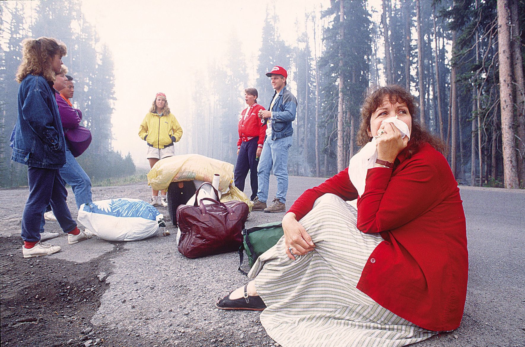 Employees at Grant Village wait to be evacuated